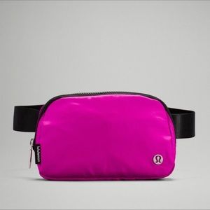 Lululemon pink and black belt bag. Worn less than a handful of times!